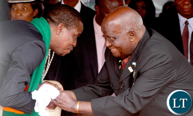 President Edgar Chagwa Lungu greets First Republican President Dr Kenneth Kaunda during Zambia's 51st Independence anniversary Celebration at Heroes Stadium in Lusaka on Saturday, October 25,2015 -Pictures by THOMAS NSAMA President Edgar Chagwa Lungu greets First Republican President Dr Kenneth Kaunda during Zambia's 51st Independence anniversary Celebration at Heroes Stadium in Lusaka on Saturday, October 25,2015 -Pictures by THOMAS NSAMA