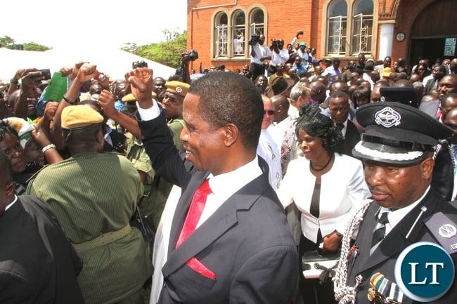 President Lungu flashes the PF party symbol after the memorial service of Late President Michael Sata at St Ignatius Catholic Church in Lusaka on Wednesday, October 28,2015 -Picture by THOMAS NSAMA President Lungu flashes the PF party symbol after the memorial service of Late President Michael Sata at St Ignatius Catholic Church in Lusaka on Wednesday, October 28,2015 -Picture by THOMAS NSAMA