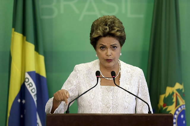 Brazil's President Dilma Rousseff axed eight ministries and announced salary cuts, including her own, in a cost-cutting measure as the country looks to stabilize its economy. PHOTO: REUTERS