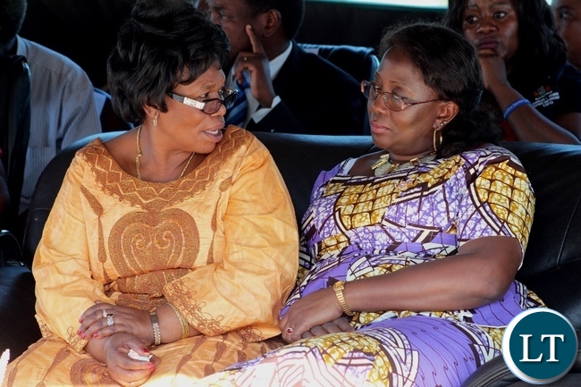 Gender Minister Prof. Nkandu Luo (l) confers with her counterpart Community Development Minister Emerine Kabanshi (r) during the launch of the Nalolo GBV One Stop Centre supported by the Government of Zambia and United Nations Joint Programe on GBV in Nalolo District Gender Minister Prof. Nkandu Luo (l) confers with her counterpart Community Development Minister Emerine Kabanshi (r) during the launch of the Nalolo GBV One Stop Centre supported by the Government of Zambia and United Nations Joint Programe on GBV in Nalolo District