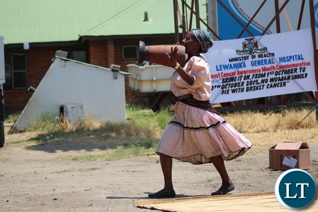 A woman performing during the Breast Cancer Awareness Month Commemoration at Lewanika General Hospital in Mongu