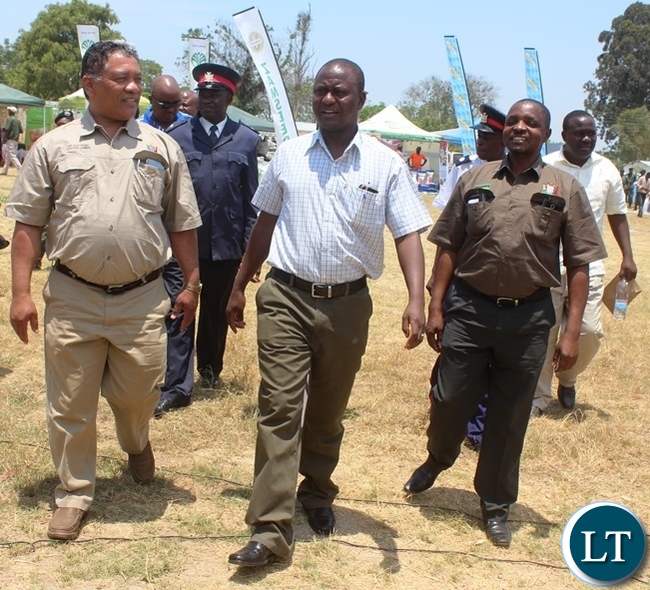 From (left) Agriculture Minister Given Lubinda, Central Province Minister Davies Chisopa and Agriculture deputy Minister Maxas Ng'onga touring stands during the Electronic Voucher launch in Kabwe's Mpima Diary farming Block