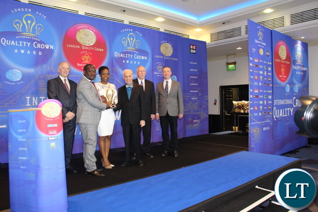 Bridget Kaunda Kauti receiving the award. Divine Cargo Services