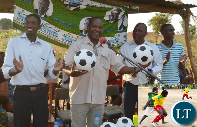 Patriotic Front Member of the Central Committee Syacheye Madyenkuku (holding balls) with Choma central Constituency party secretary Joel Kamoko (left) and Constituency chairperson Timothy Siakaziba (immediate right) about to present footballs to the winner of the Sikalongo ward tournament sponsored by Mr Kamoko at the weekend. Insert, Limpo Siachaba (in green jersey) of Mochipapa Research football club fight for the ball with Moses Muleya of Sikalongo football club. Patriotic Front Member of the Central Committee Syacheye Madyenkuku (holding balls) with Choma central Constituency party secretary Joel Kamoko (left) and Constituency chairperson Timothy Siakaziba (immediate right) about to present footballs to the winner of the Sikalongo ward tournament sponsored by Mr Kamoko at the weekend. Insert, Limpo Siachaba (in green jersey) of Mochipapa Research football club fight for the ball with Moses Muleya of Sikalongo football club.