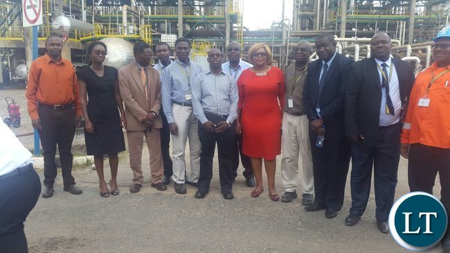 Dora Siliya with officials from Indeni
