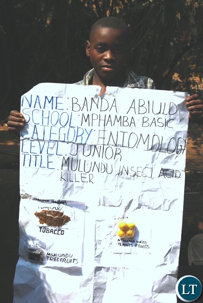 Abiudi Banda in Grade 9 when he was 15 years showing one of his projects in Entomology. He had made an insecticide from natural products; tobacco and 3 other ingredients from the bush.