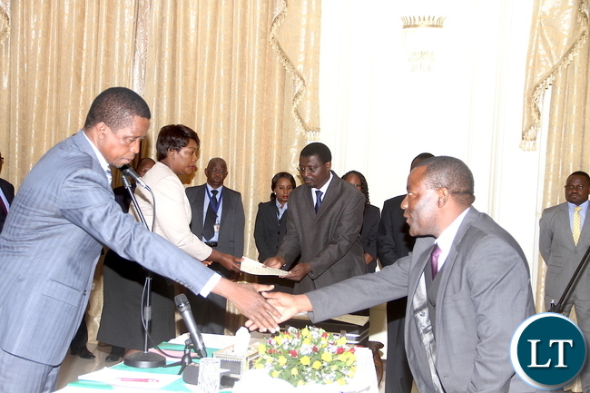 President Lungu with Vice-President Inonge Wina, Commerce minister Margaret Mwanakatwe and newly appointed Commerce deputy minister Raymond Mpundu after the swearing-in-ceremony at State House on Tuesday, November 10,2015 -Picture by THOMAS NSAMA