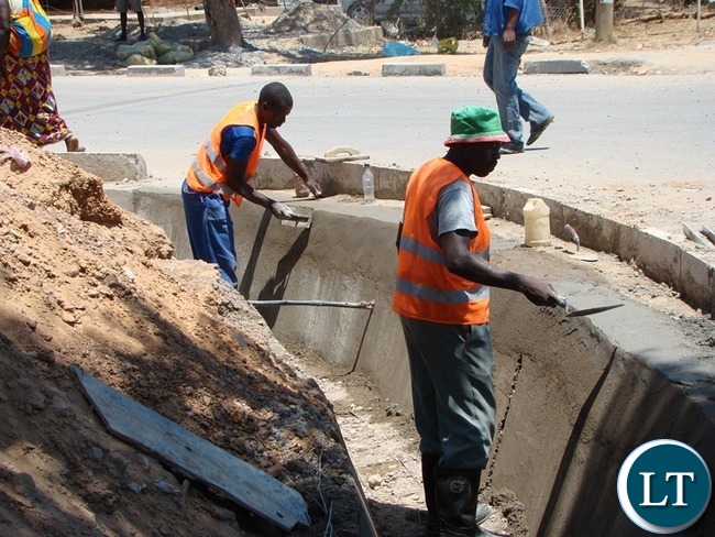 SOME of the roads in Choma district, which is now Southern province Headquarter, have been upgraded to bituminous standard. On the picture the contractor is now working on the drainage system before the onset of the rains.