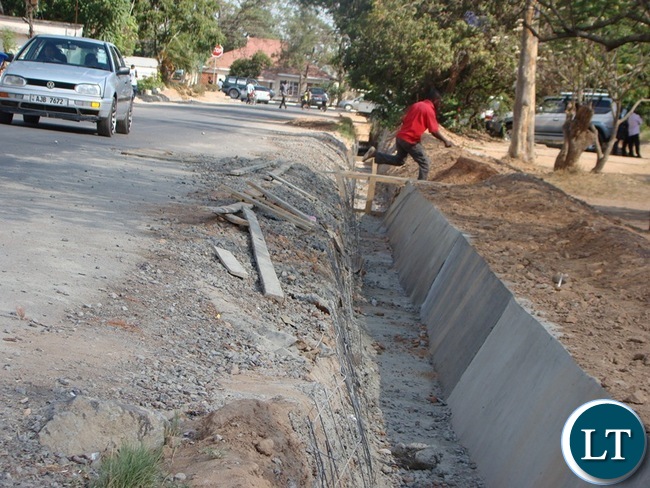 SOME of the roads in Choma district, which is now Southern province Headquarter, have been upgraded to bituminous standard. On the picture the contractor is now working on the drainage system before the onset of the rains.