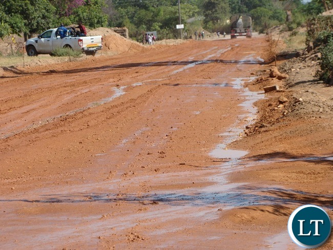 ZAMBIA National Service has been empowered with some more road equipment machinery by the government. In the picture is a water bowser truck watering in of the Mochipapa township roads in Choma. ZAMBIA National Service has been empowered with some more road equipment machinery by the government. In the picture is a water bowser truck watering in of the Mochipapa township roads in Choma.