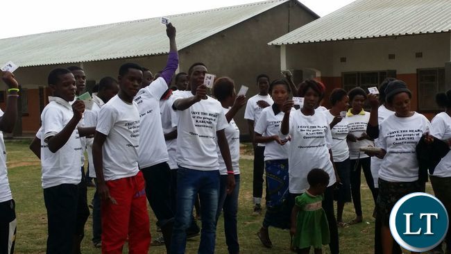 We are ready to vote! Young people seem to be shouting after obtaining their NRC's and voters cards in Kabushi constituency