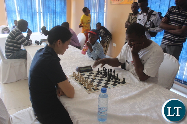 Chess Grandmaster Zhu Chen and playing with Daniel Jere at OYDC