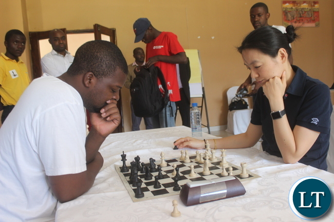 Chess Grandmaster Zhu Chen and playing with Daniel Jere at OYDC