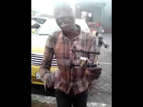Misisi Compound Boy Explaining Principles of Electricity in Nyanja