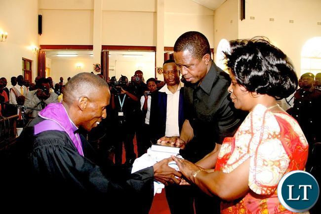 President Lungu and First Lady Esther Lungu receives a Bible from UCZ Bishop Sydney Sichilima during the Church service at St Margaret UCZ congregation in Kitwe on Sunday, November 1,2015 -Picture by THOMAS NSAMA
