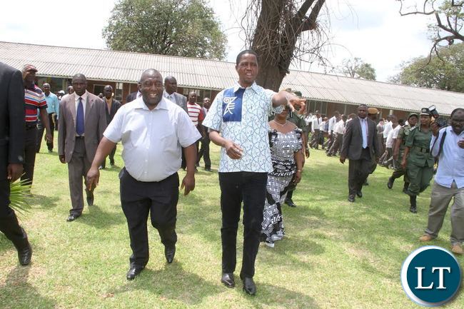 President Lungu with Copperbelt Minister Mwenya Musenge during a tour of Mukuba Secondary school pupils. This was when the Head of State visited his former school in Kitwe on November 2,2015 -Picture by THOMAS NSAMA