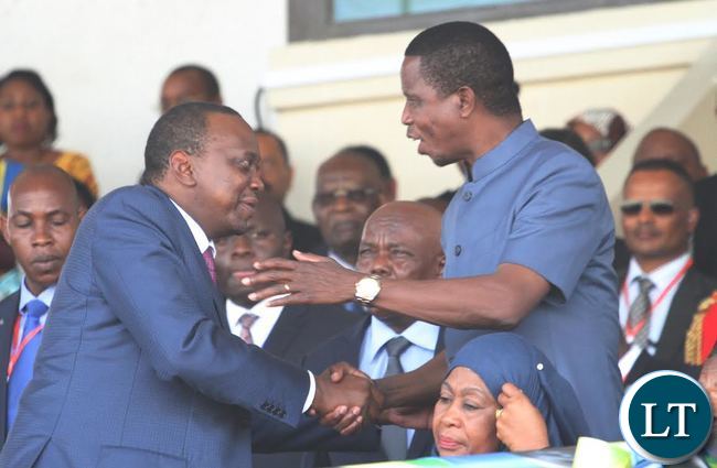 President Edgar Lungu shakes hands with Kenyan President Uhuru Kenyatta during the Inauguration ceremony of newly elected Tanzanian President Dr John Pombe Magufuli at Uhuru stadium in Dar es salaam.