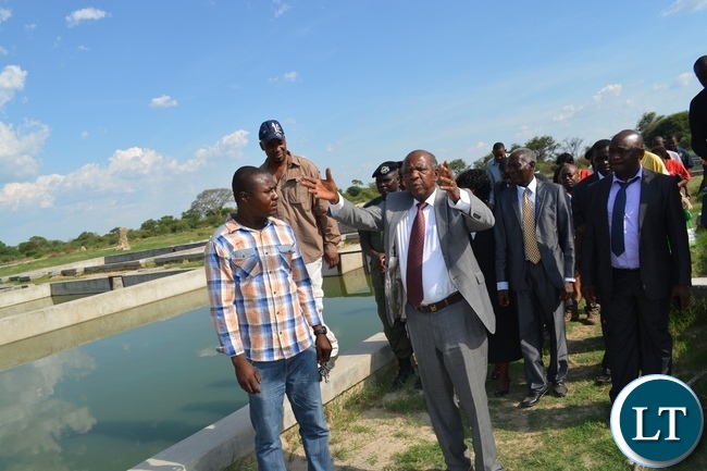 Finance Minister Alexander Chikwanda at Inyambo Community Development Trust where he gave them a loan of K3, 3 million to boost fish production Finance Minister Alexander Chikwanda at Inyambo Community Development Trust where he gave them a loan of K3, 3 million to boost fish production