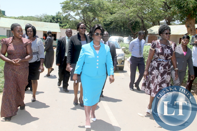 First Lady Esther Lungu took time off her busy schedules and visited families of State House staff. The First Lady wanted to see how members of staff and their families are living in the Police Camp on Thursday, December 10,2015 -Picture by THOMAS NSAMA
