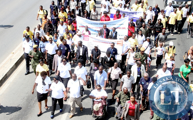First Lady Esther Lungu marching from Northmead to Showgrounds during the Commemoration of the International Day for Persons with Disabilities on Thursday, December 3,2015 -Picture by THOMAS NSAMA