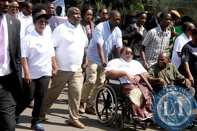 First Lady Esther Lungu marching from Northmead to Showgrounds during the Commemoration of the International Day for Persons with Disabilities on Thursday, December 3,2015 -Picture by THOMAS NSAMA