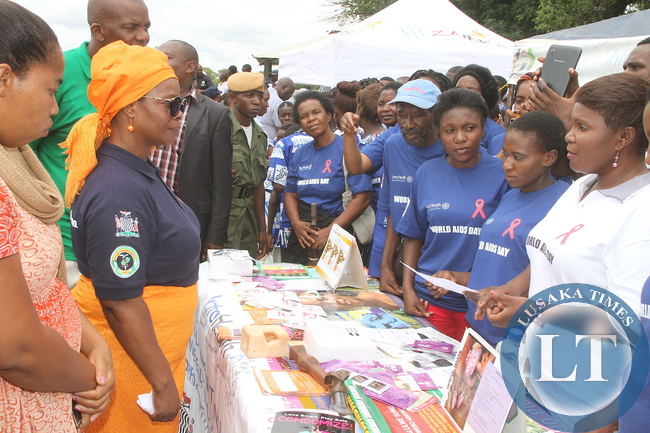 First Lady tours stands during the World AIDS day Commemoration march past in Livingstone on Monday, December 1,2015 -Picture by THOMAS NSAMA
