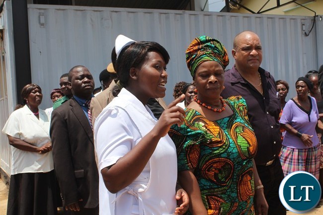 FIRST Lady Easter Lungu listens to Mahatma Gandhi clinic Nurse In-Charge Wrayrose Lombe during the tour of the health institution in Livingstone yesterday. Far right is Livingstone Member of Parliament Lawrence Evans.