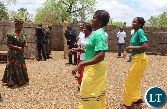 FIRST Lady Esther Lungu (left) dances with senior chief Mukuni’s village women. This was when the First Lady paid a courtesy call at the chief’s palace in Kazungula FIRST Lady Esther Lungu (left) dances with senior chief Mukuni’s village women. This was when the First Lady paid a courtesy call at the chief’s palace in Kazungula