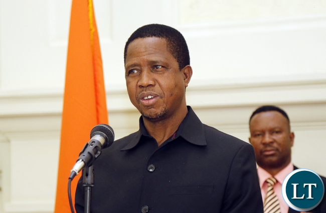 President Edgar Lungu after he received the Constitution Amendment bill that was passed by parliament last week. President Edgar Lungu reiterating that he would assent to the document in the first week of January, next year. PICTURE BY EDDIE MWANALEZA/STATEHOUSE . 23-12-2015