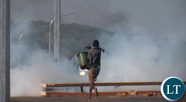 Some tenants riots against their eviction on Contract Haulage houses in Chipata yesterday.The tenants burnt tyres and block the Great East road.Pictures By VINCENT SOKO