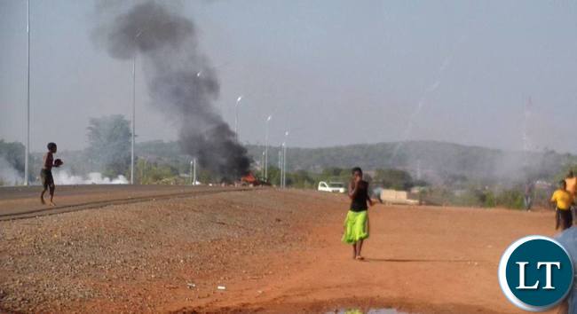 Some tenants riots against their eviction on Contract Haulage houses in Chipata yesterday.The tenants burnt tyres and block the Great East road.Pictures By VINCENT SOKO