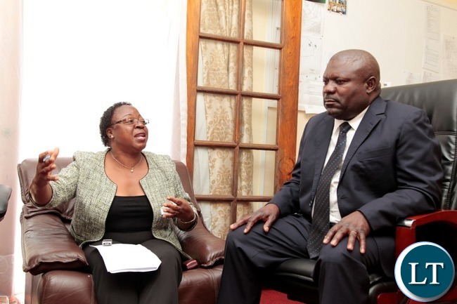 Zambia Association Women in Constructions (ZAWIC) President Dorothy Mulwila speaks to Special Assistant for Project and Monitoring to the President Lucky Mulusa at State House when they called on him