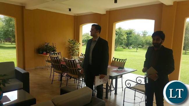 Bloomberg's Zambia Correspondent Mathew Hill and a colleague after interviewing HH