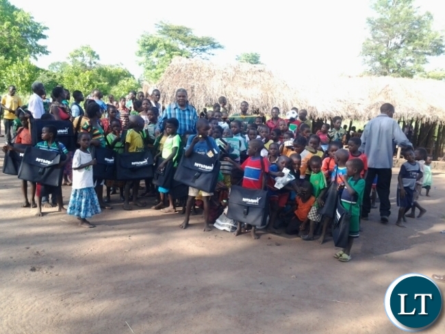 Malambo Patriotic Front Member of Parliament Jacob Shuma with Chitilila community school pupils in Mambwe.The grass thatched community school is serving a number of pupils who had not enrolled due to distances to the nearest schools. Malambo Patriotic Front Member of Parliament Jacob Shuma with Chitilila community school pupils in Mambwe.The grass thatched community school is serving a number of pupils who had not enrolled due to distances to the nearest schools.