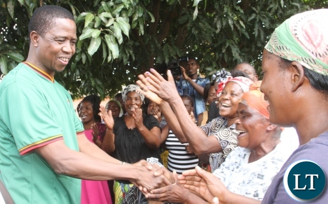 President Lungu presents New Year gifts to the Aged in Lusaka's Matero Township on January 1,2015 -Picture by THOMAS NSAMA
