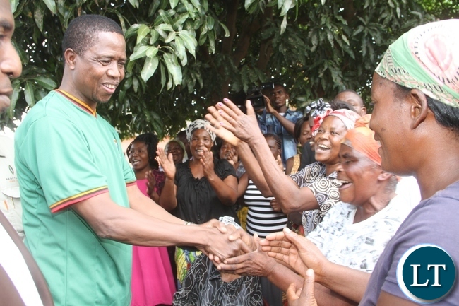 President Lungu presents New Year gifts to the Aged in Lusaka's Matero Township on January 1,2015 -Picture by THOMAS NSAMA
