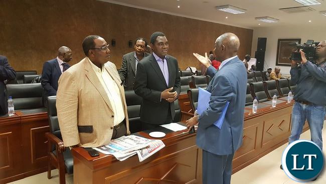 VETERAN Politician Vermon Mwanga stresses a point to UPND leader Hakainde Hichilema and his Vice President, Godfrey Bwalya at the Courtyard Hotel in Lusaka where opposition Political Parties among them Rainbow Party,UPND, ADD, Peoples Party, Green Party, UPP and NDP are scheduled to hold a joint press conference.