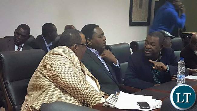 RAINBOW Party leader Wynter Kabimba speaks to UPND leader Hakainde Hichilema and his vice president Godfrey Bwalya at joint press conference by various opposition Political Parties among them Rainbow Party,UPND, ADD, Peoples Party, Green Party, UPP and NDP.