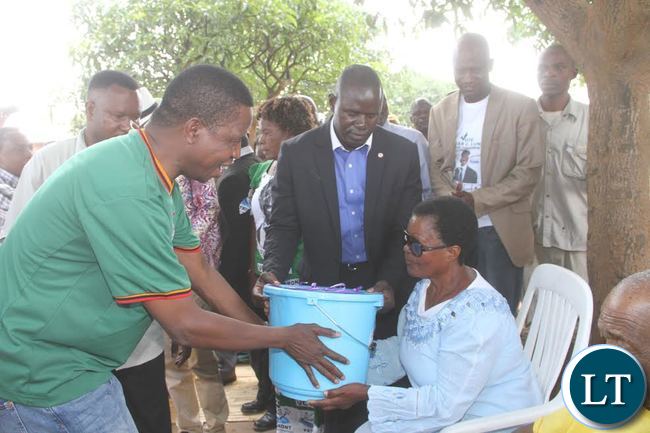 President Lungu presents the New Year gift to the Aged in Lusaka's Matero Township on January 1,2015 -Picture by THOMAS NSAMA