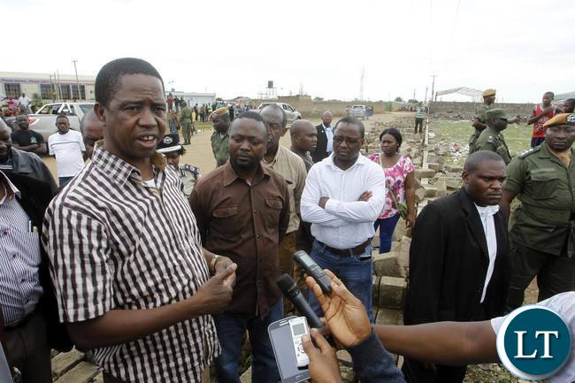 President Edgar Chagwa Lungu inspects the damage caused by Hail Storm along Kafue Road in Lusaka on Saturday,January 9,2015. PICTURE BY SALIM HENRY/STATE HOUSE ©2016