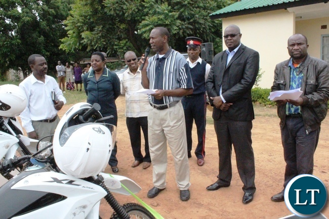 Kasama District Commissioner Kelly Kashiwa (stripped T/Shirt) hands over 22 motorbikes worth US 66000 dollars in Kasama today, donated by the Scaling up Nutrition (SUN) Programme for Kasama and Kaputa districts in Northern Province. Looking on is SUN Provincial Coordinator Mata Nyambe - Picture by Mary Bwembya (ZANIS). Kasama District Commissioner Kelly Kashiwa (stripped T/Shirt) hands over 22 motorbikes worth US 66000 dollars in Kasama today, donated by the Scaling up Nutrition (SUN) Programme for Kasama and Kaputa districts in Northern Province. Looking on is SUN Provincial Coordinator Mata Nyambe - Picture by Mary Bwembya (ZANIS).