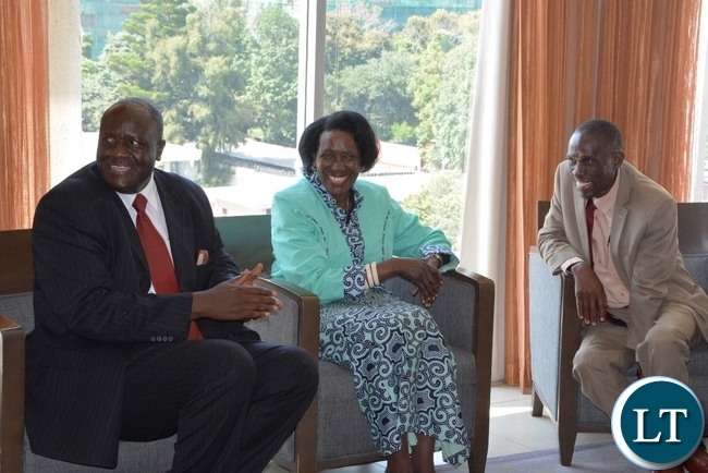 Vice President Inonge Wina with her Deputy Minister Lowrance Sichalwe and Permanent Secretary Simon Miti having a light Moment shortly before meeting with donors at Intercontinental Hotel
