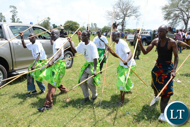 President Lungu receives from a ten year old Lushomo Mutanga on his arrival at Namwala grounds