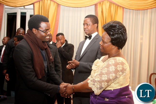 First Lady Esther Lungu greets one of the Zambian’s living in Italy during dinner hosted for the President by Zambia’s Ambassador to Italy Gertrude Mwape in Rome on Friday, February 6,2016 -Picture by THOMAS NSAMA