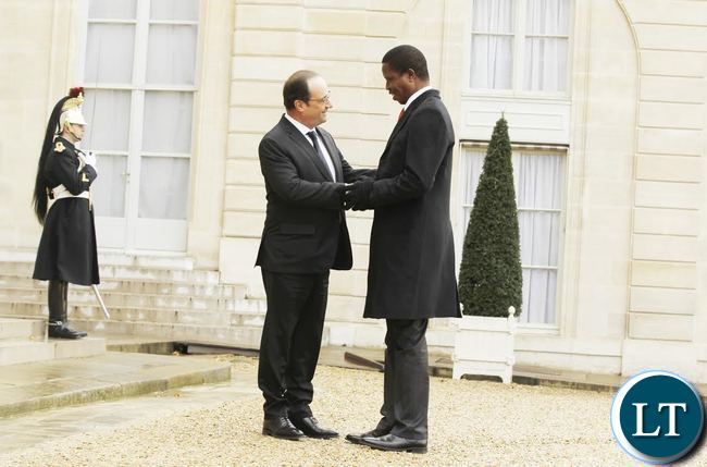President Edgar Chagwa Lungu (right) being welcomed by French President Francois Hollande at Elysee Palace in Paris, France on Monday,February 8,2016. PICTURE BY SALIM HENRY/STATE HOUSE ©2016.