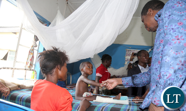 President Lungu talks a Patient at Namwala hopsital 3579 President Edgar Lungu Talks to a young Patient at Namwala Disrict Hospital on Staturday - Picture By Eddie Mwanaleza/statehouse. 13-2-2016.