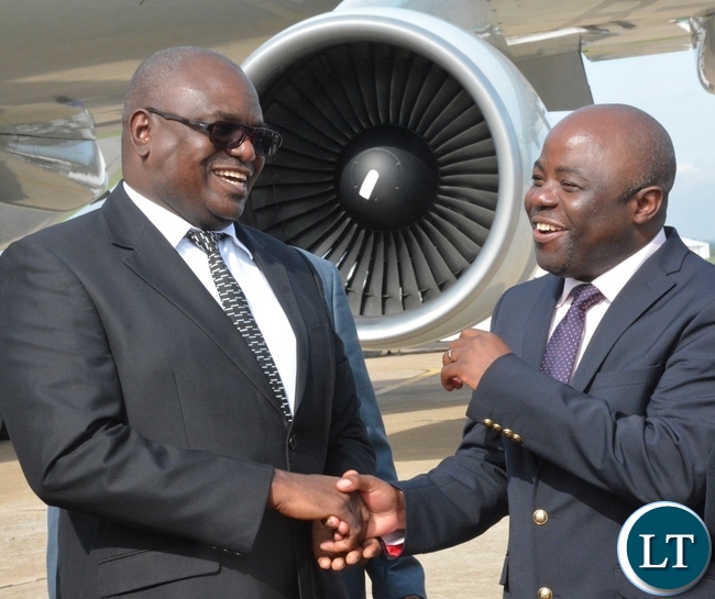 Speaker of the National Assembly Patrick Matibini(l) having a light moment with Minister of Local Government and Housing Stephen Kampyongo(r) just after seeing off Chairman of the Standing committee of the National peoples congress of China H.E Zhang Dejiang at KK airport Speaker of the National Assembly Patrick Matibini(l) having a light moment with Minister of Local Government and Housing Stephen Kampyongo(r) just after seeing off Chairman of the Standing committee of the National peoples congress of China H.E Zhang Dejiang at KK airport