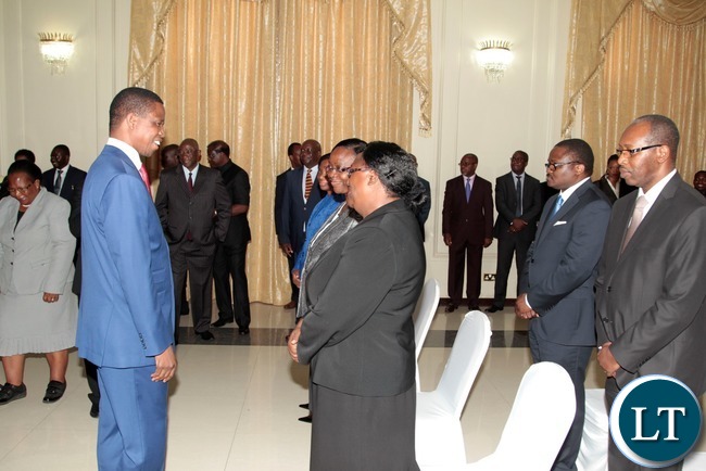 President Edgar Lungu chats with Constitutional Court Judges shortly after swearing in Ceremony of Constitutional Court Judges at State House