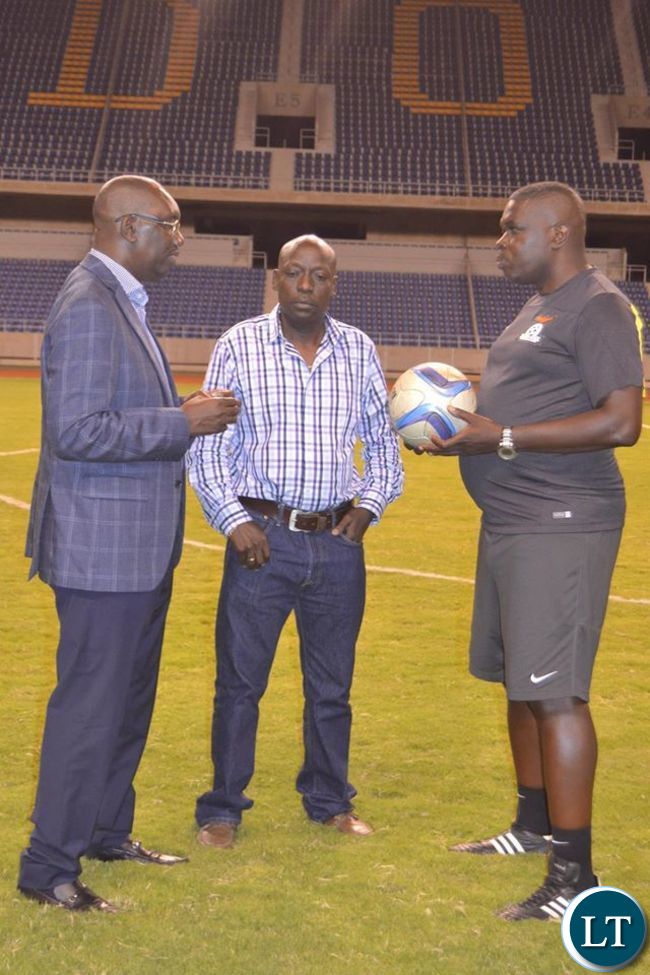 Andrew Kamanga talking to Coach Lwandamina