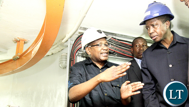 COMMISSIONING OF ITEZHI TEZHI HYDRO POWER STATION President Edgar Chagwa Lungu (right) listens as ZESCO Managing Director Victor Mundende explains how Hydro Power is generated during the commissioning of 120MW Itezhi Tezhi Hydro Power Station in Itezhi Tezhi Central Province on Friday,March 4, 2016. PICTURE BY SALIM HENRY/STATE HOUSE ©2016.